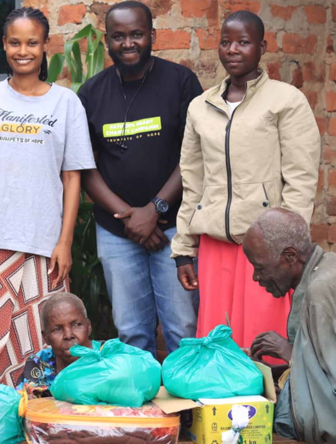 Team visiting a family in Sekanyonyi
