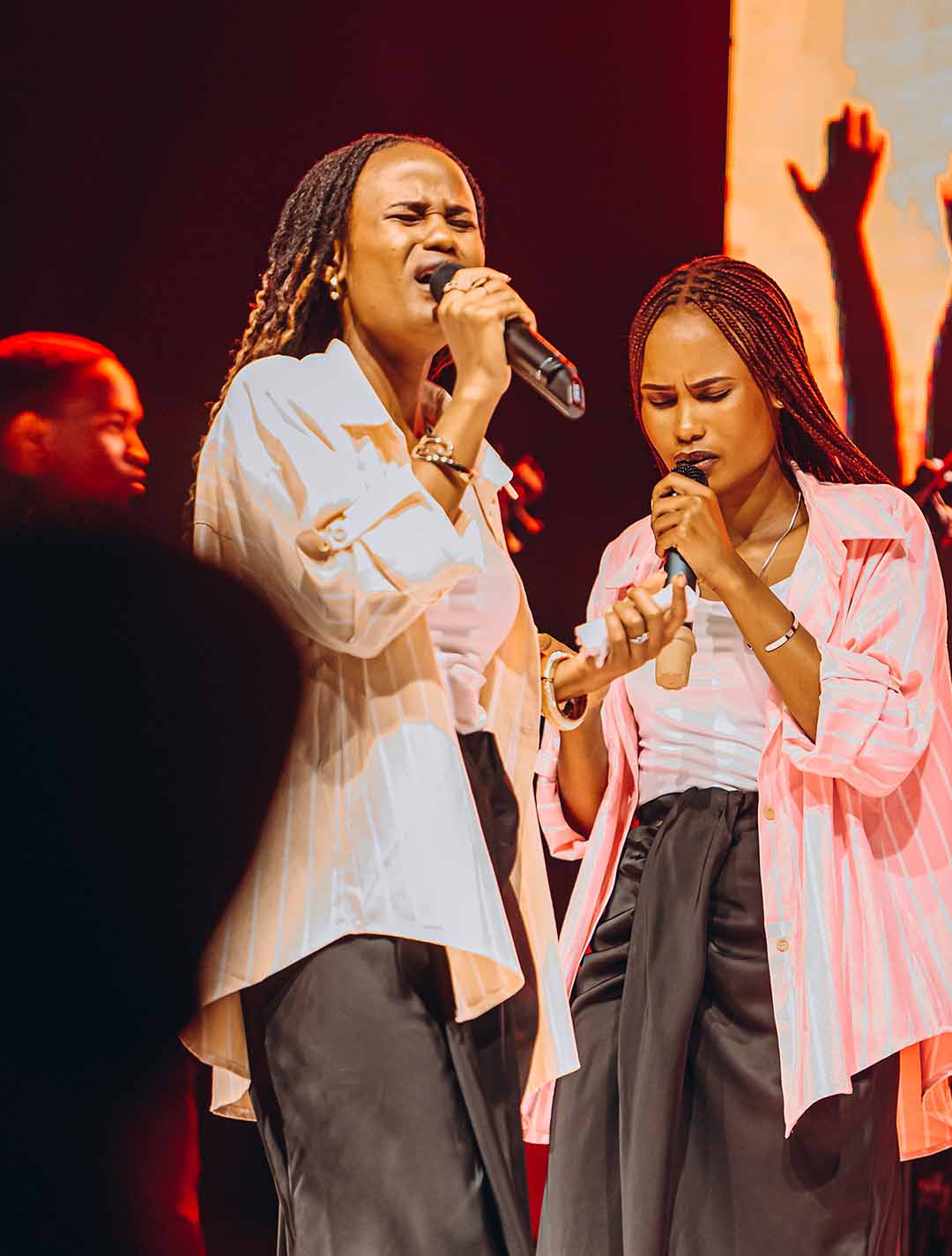 Band praying together before a worship set